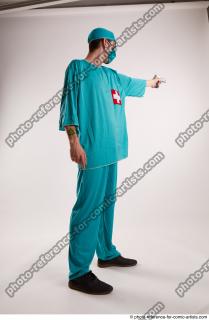 14 2018 01 FALCO DOCTOR WITH GUN